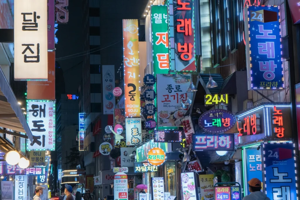 Neon signs of Seoul Myeongdong shopping street at night