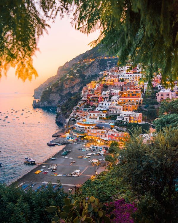 Couple enjoying panoramic sunset from private terrace